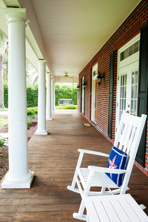 Charming Front Porch with High Quality Petrified Wood Flooring