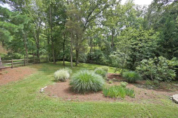 Backs to Private Wooded Setting
