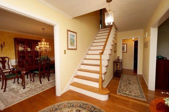 Open to formal living and dining rooms