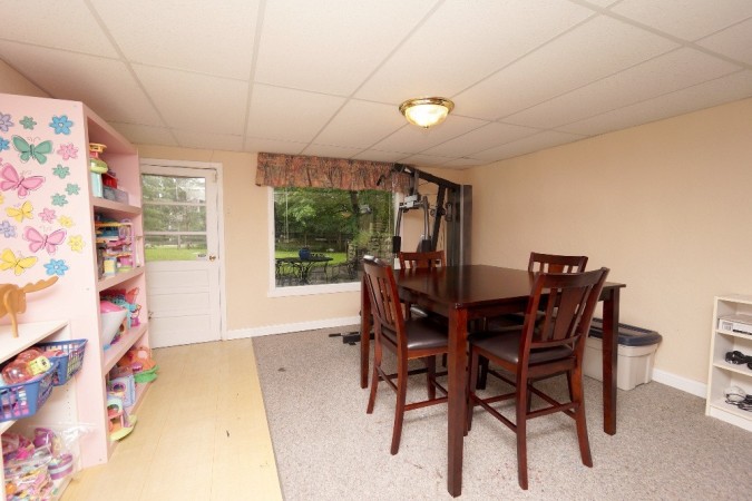 Play area with walkout to rear patio