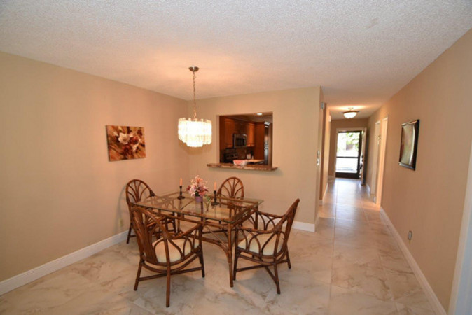 Dining area with bar area from kitchen ... how convenient is that!