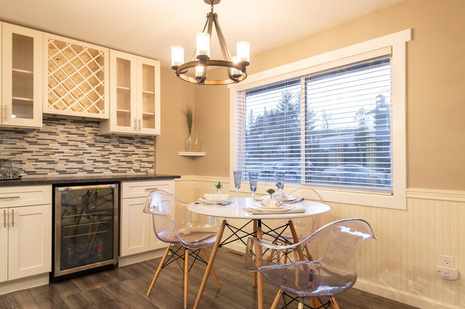 Eat in area is light and bright and opens to the family room.