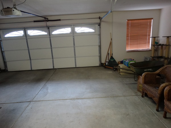 2.5 car garage provides space for storage or a shop